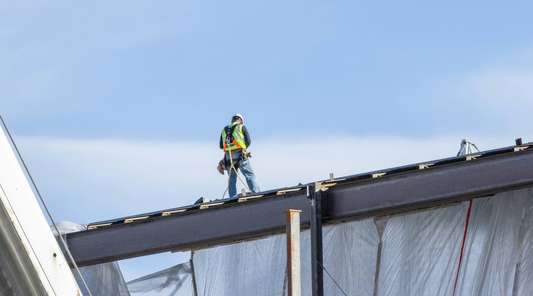 Construction Worker with Roof Safety Equipment