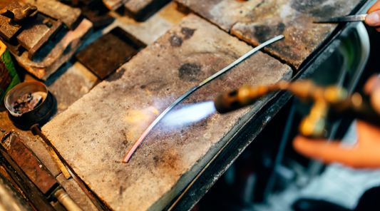 worker heating metal