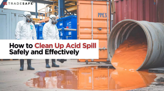 workers in full ppe near an acid spill from a large container