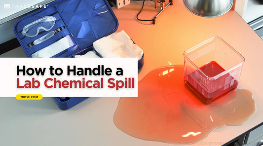 laboratory spill kit and spilled red liquid on a lab table