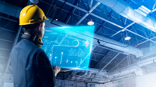 manufacturing worker using technology