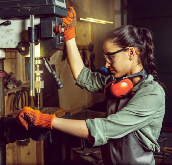 woman using drilling machine