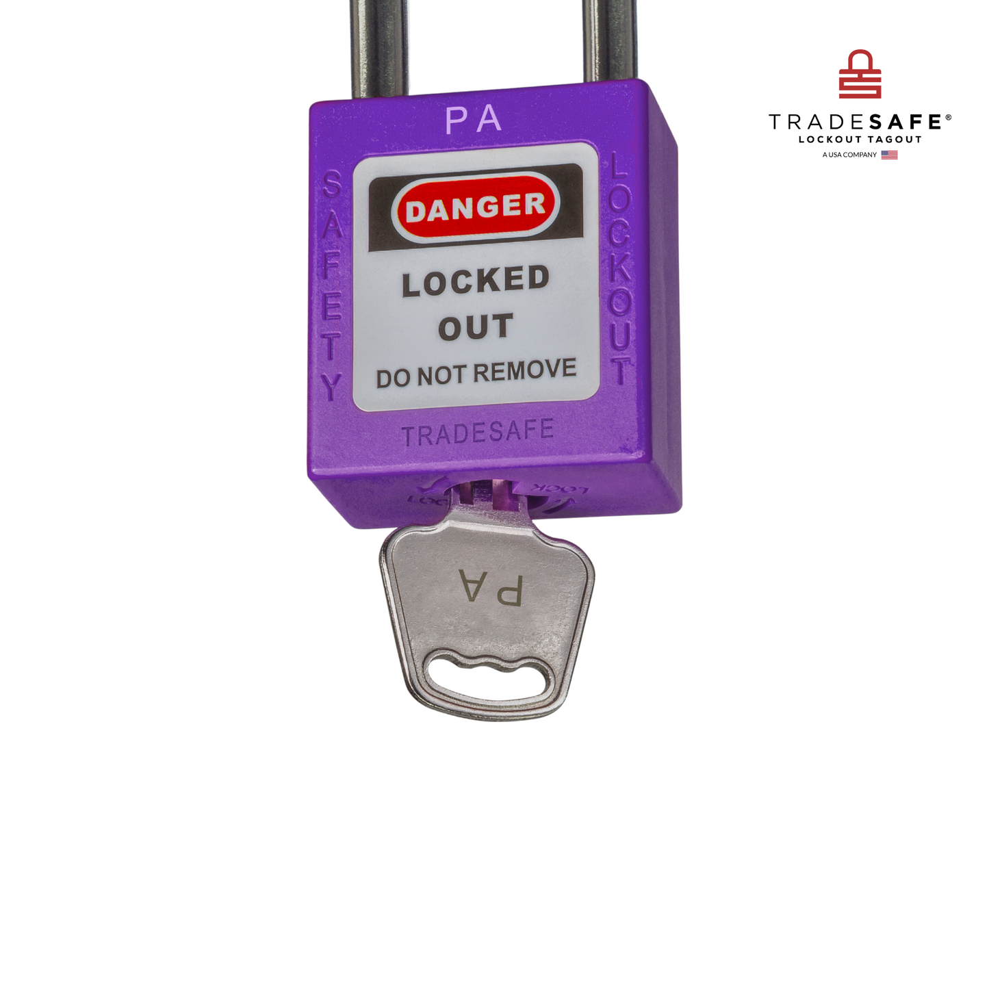 a close-up view of a purple loto padlock's body with a key inserted