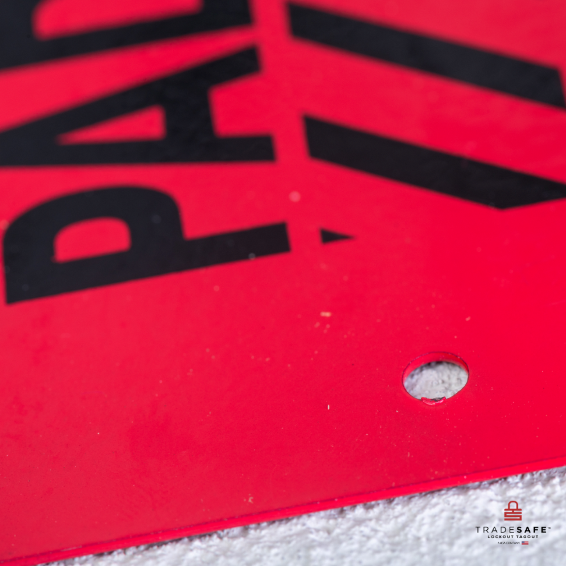 close up view of the edge of a padlock station