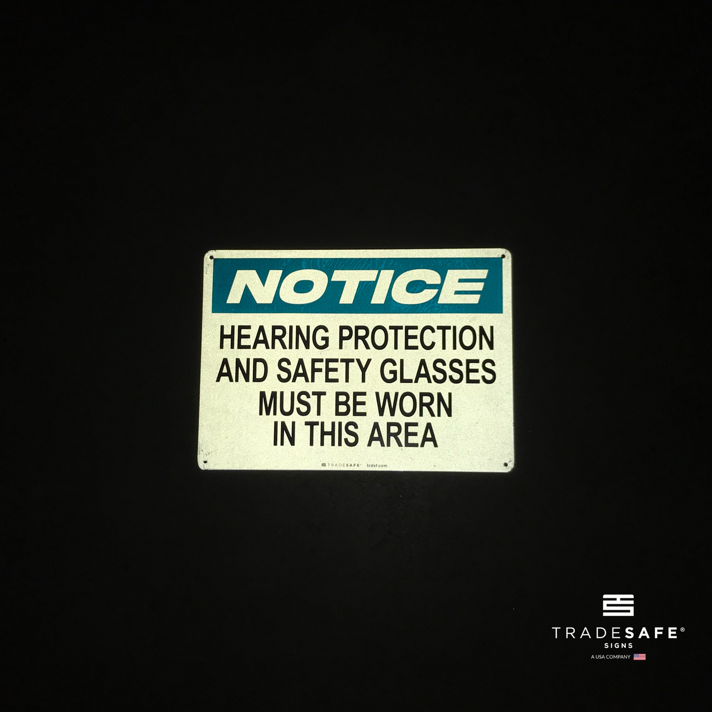 reflective attribute of notice sign on black background