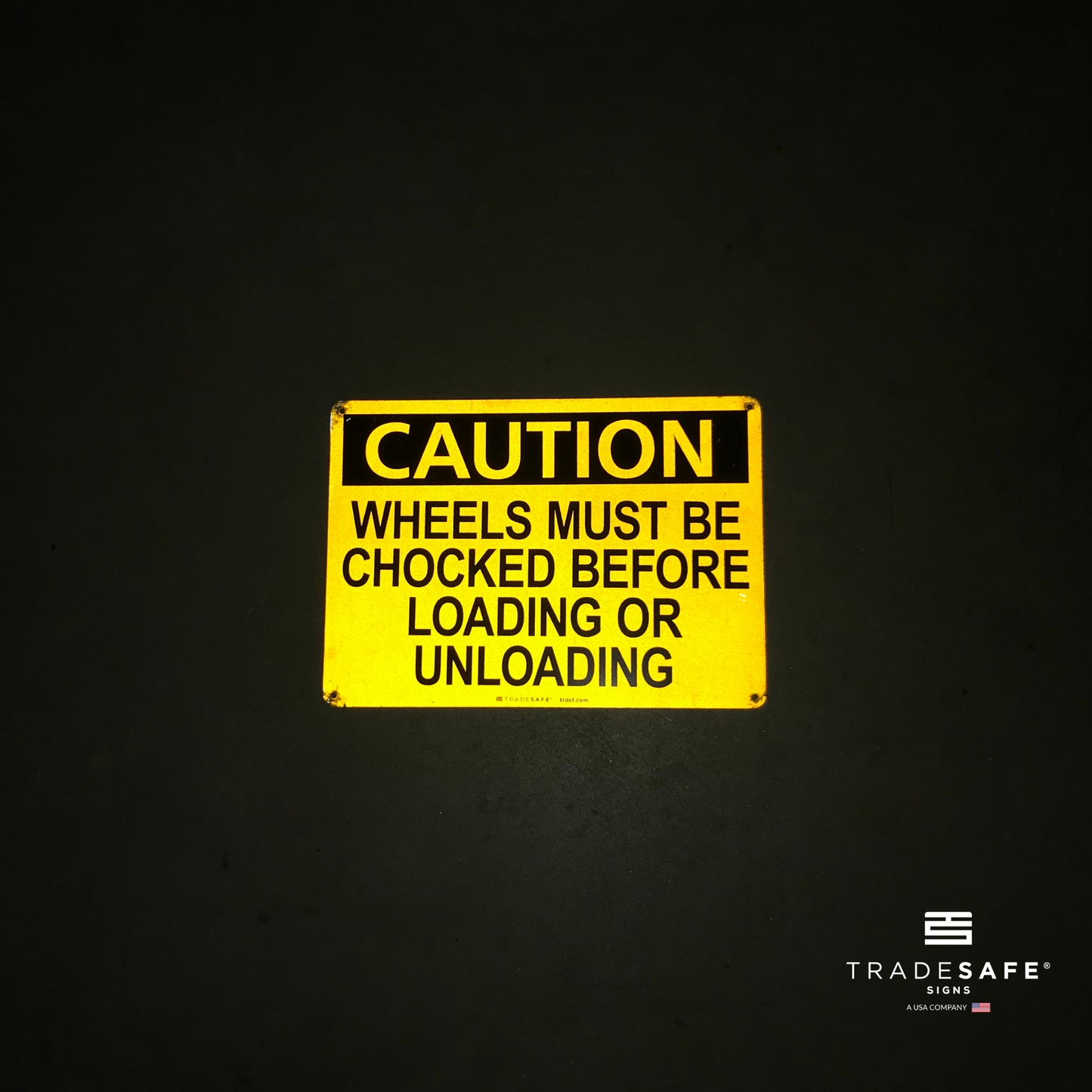 reflective attribute of caution sign on black background