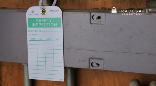 Safety inspection tag attached to a factory equipment