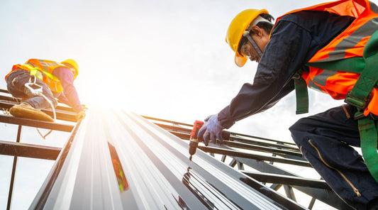 workers wearing construction personal protective equipment