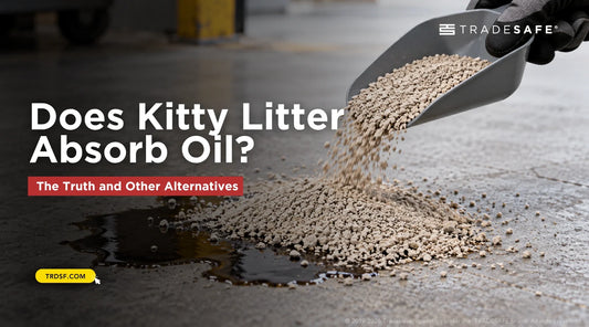 Clay cat litter being applied to a small oil spill on concrete.