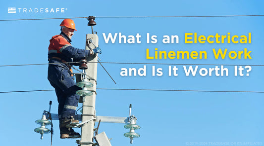 power lineman on a transmission pole