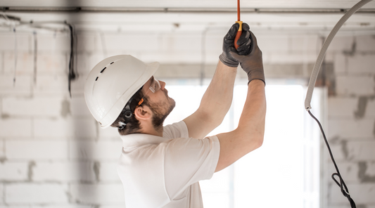 worker installing light