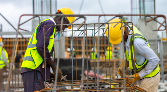 construction workers wearing hard hats