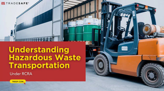 forklift loading hazardous waste drums