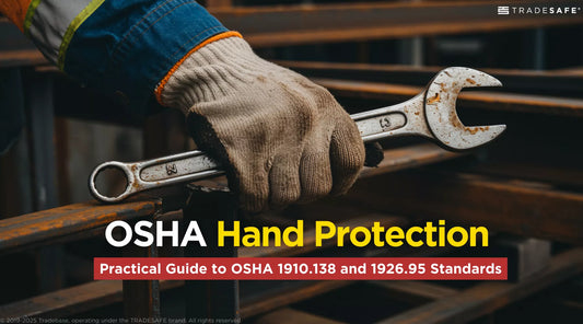 gloved hand holding a wrench