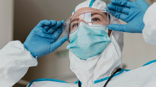 Close up of woman wearing PPE