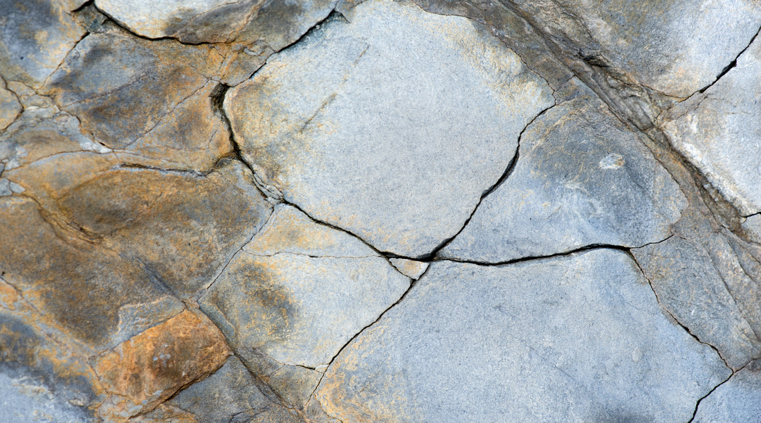 stone surface with fractures and cracks