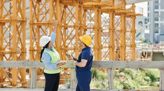 two workers talking