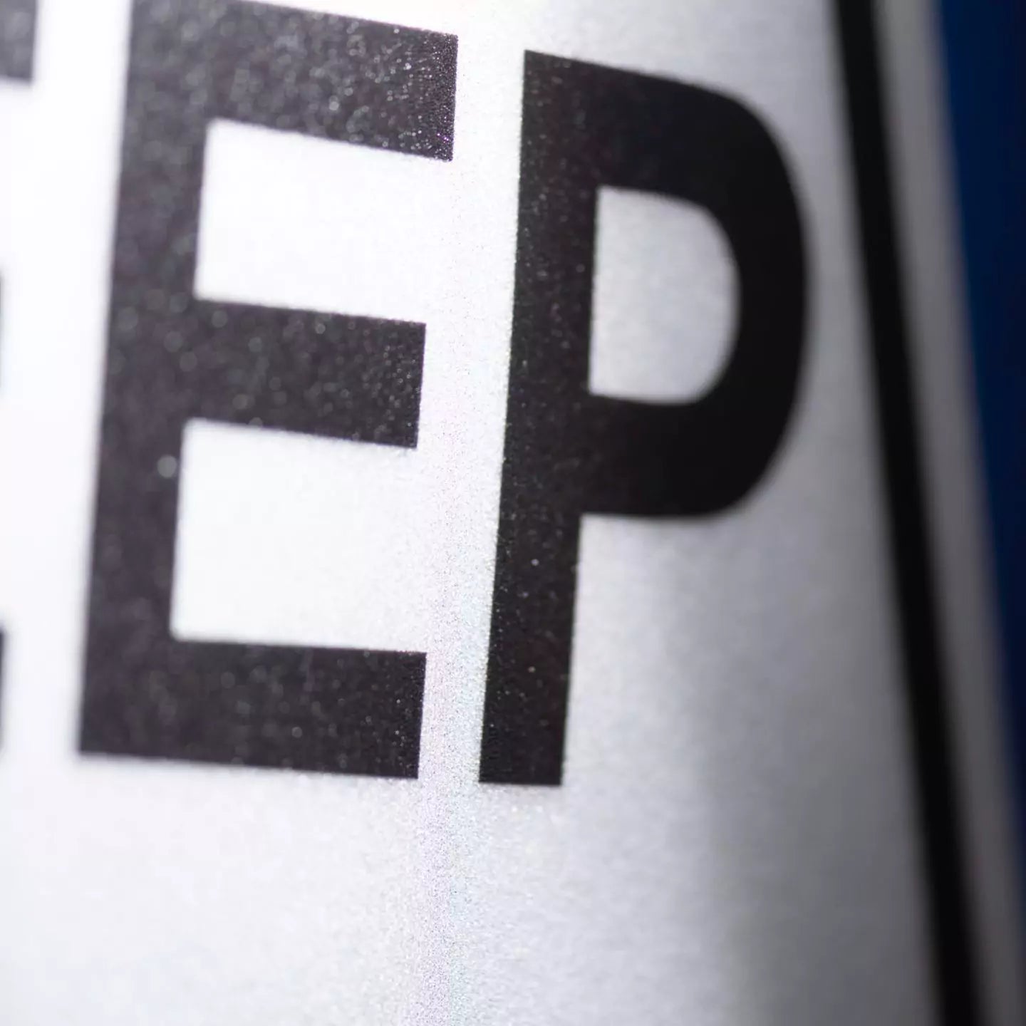 macro shot of keep clear sign