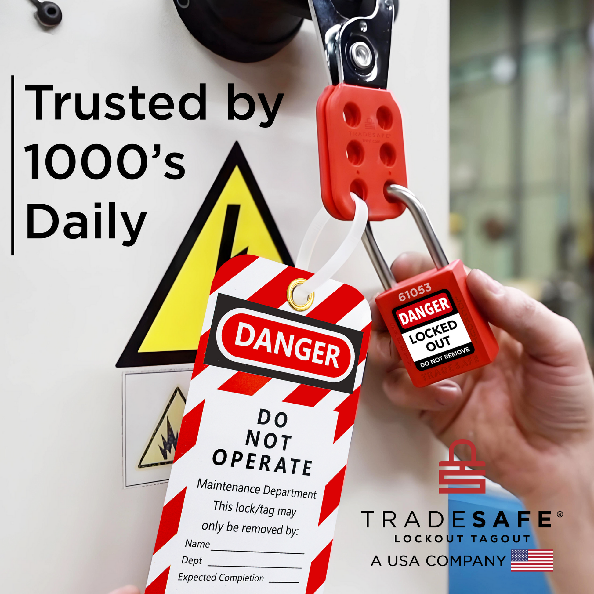 a loto tag in-use along with a loto lock and a steel hasp for a machine with electrical hazard