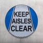 keep aisle clear sign on wall