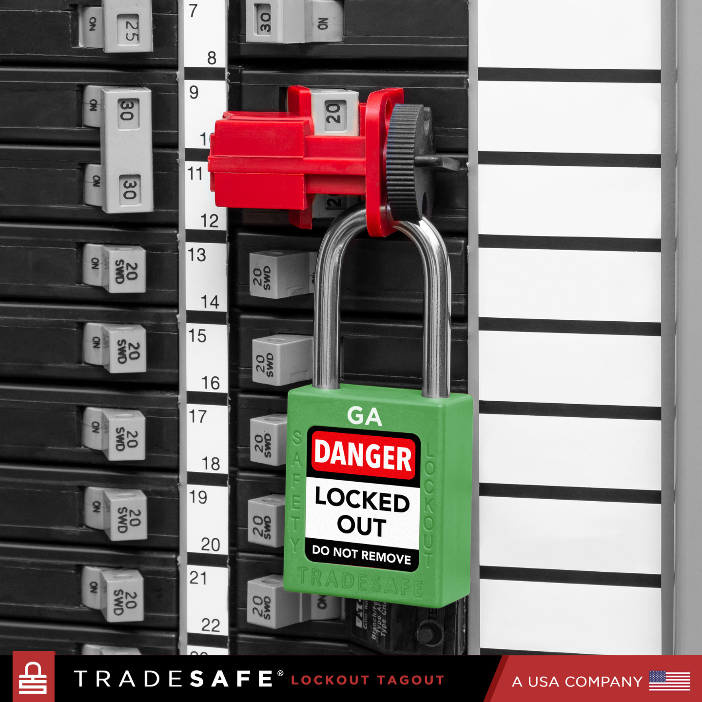 a green loto padlock in use along with a circuit breaker lock