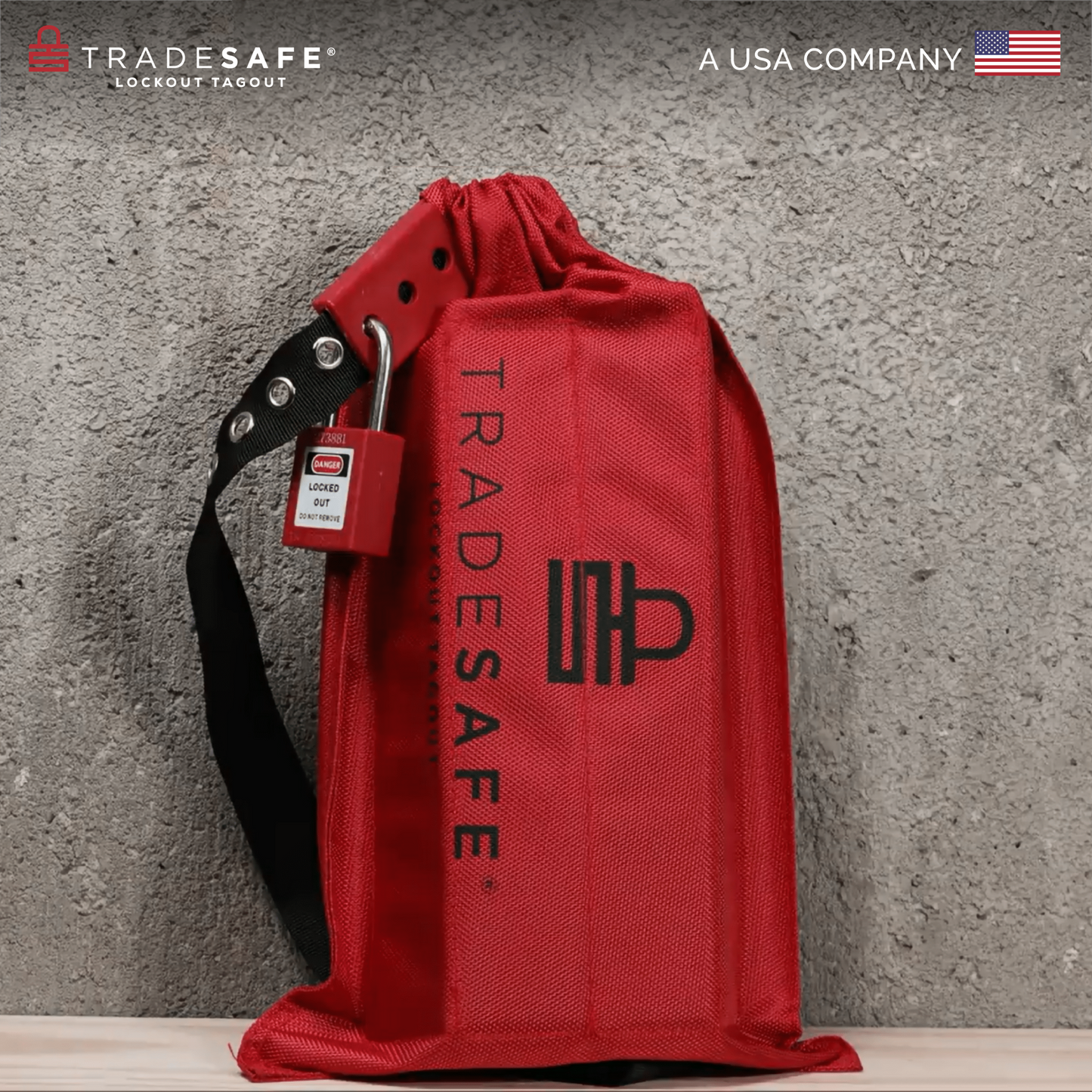 in-use image of lockout tagout cinch bag with padlock in industrial background