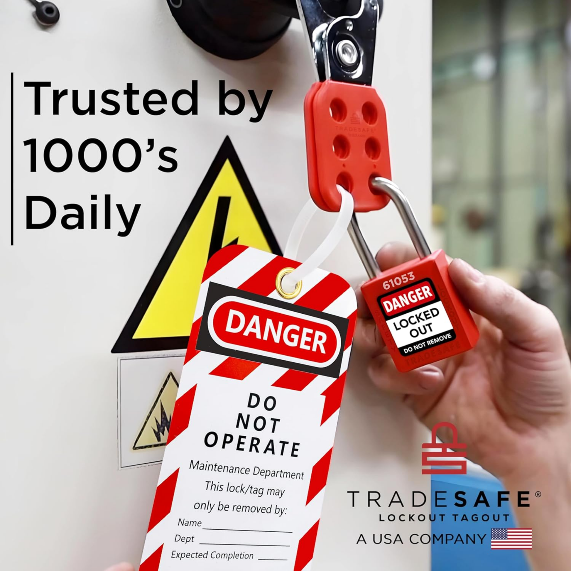 a loto tag in-use along with a loto lock and a steel hasp for a machine with electrical hazard