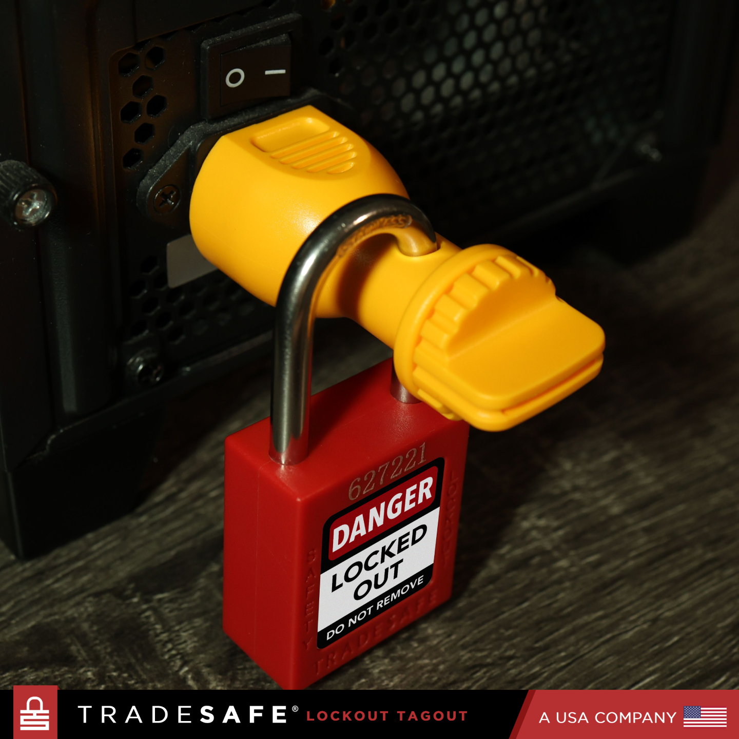 power plug lock securely fastened with a padlock