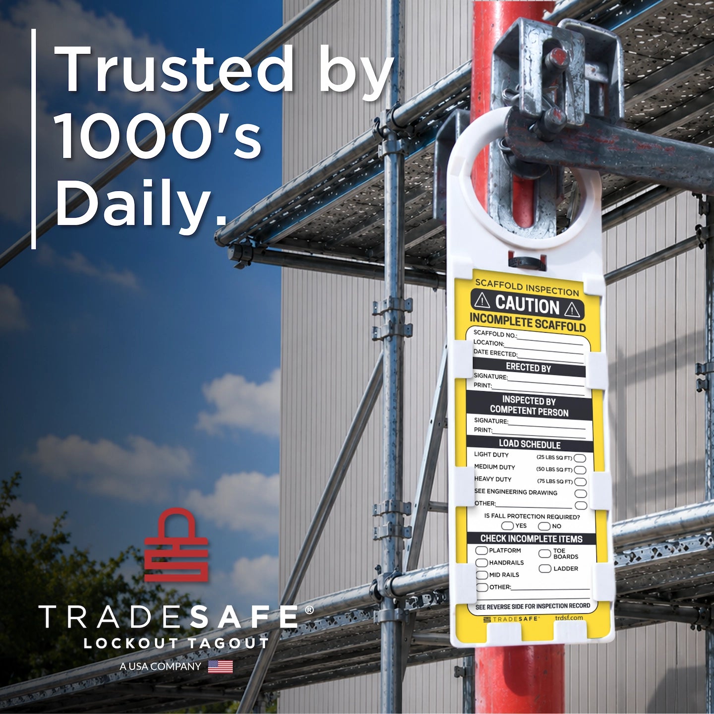 Tradesafe scaffold tag and holder in an outdoor construction setting. Trusted by 1000's Daily branding