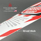 macro shot of slanted loto bilingual tag showing its thickness; 32-mil thick