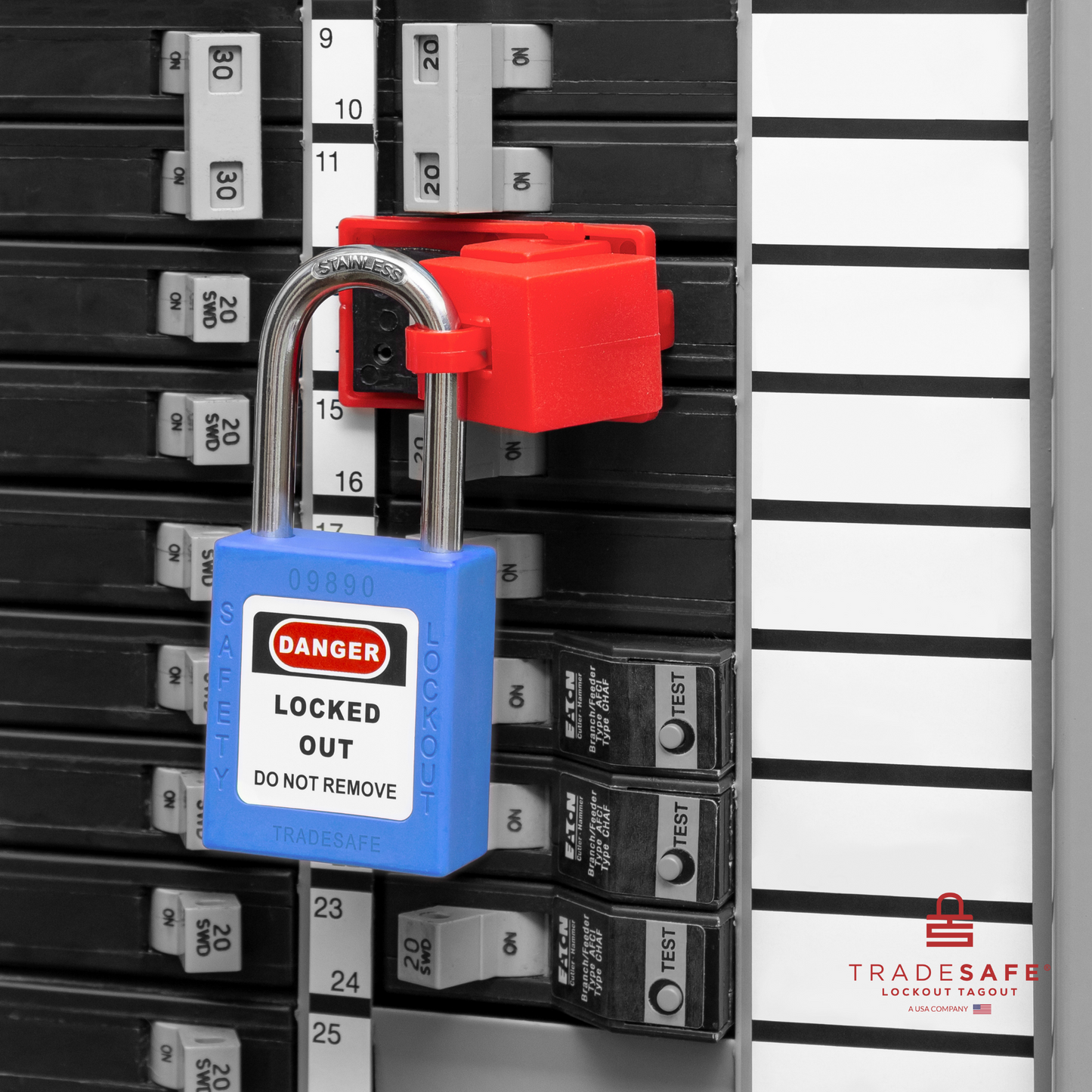a blue loto padlock in use along with a clamp-on circuit breaker lock