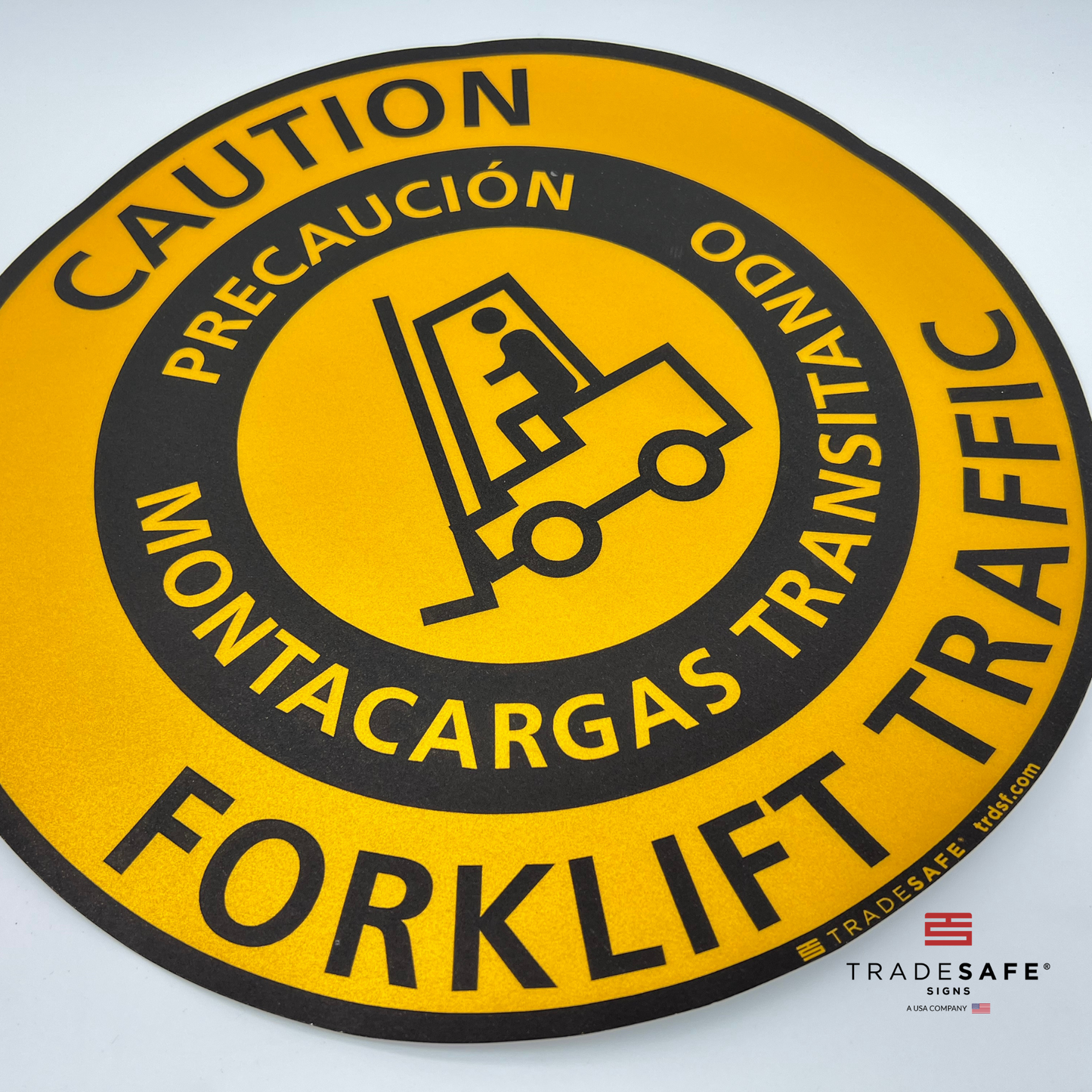 close-up of bilingual (english/spanish) caution forklift traffic sign