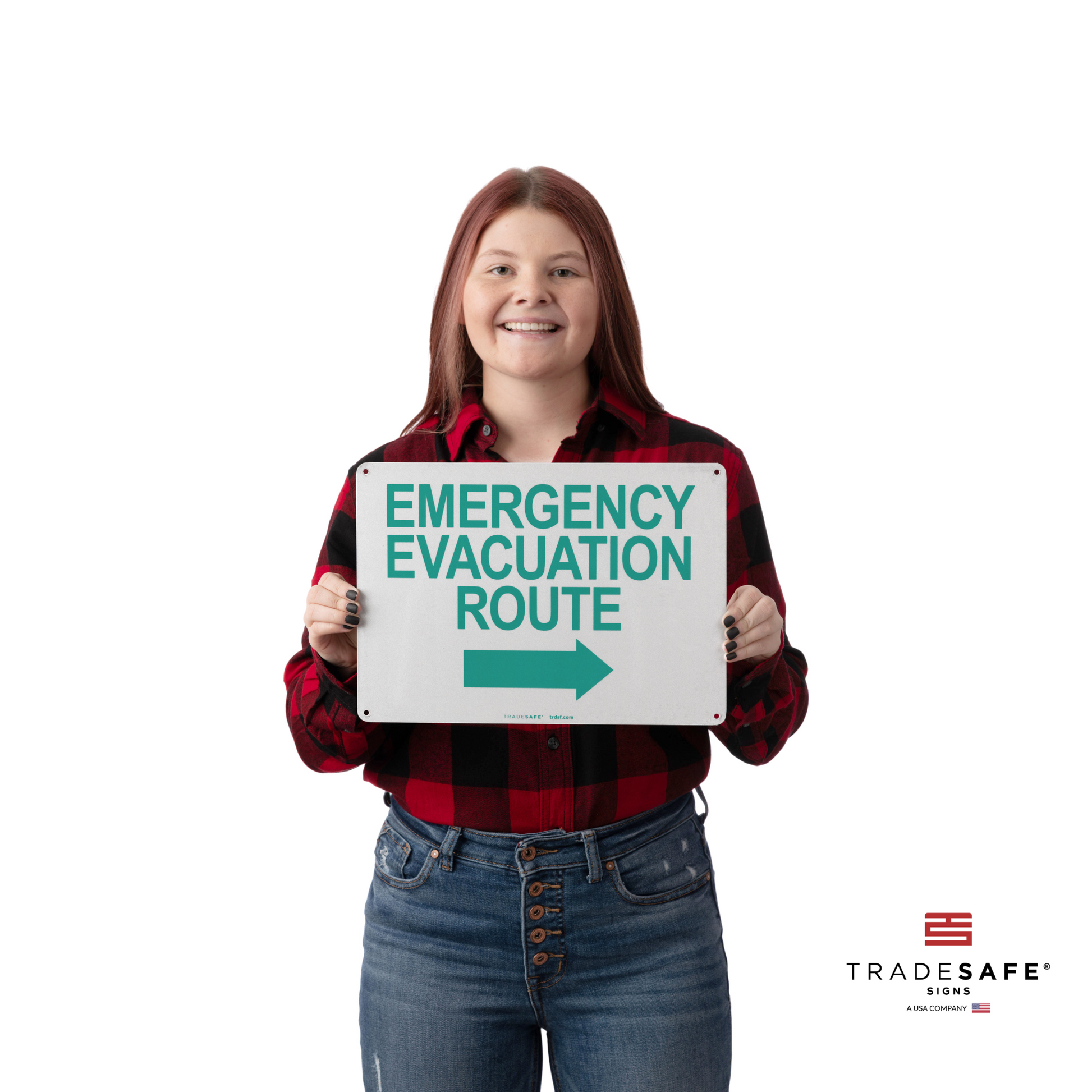 a person holding emergency evacuation route sign