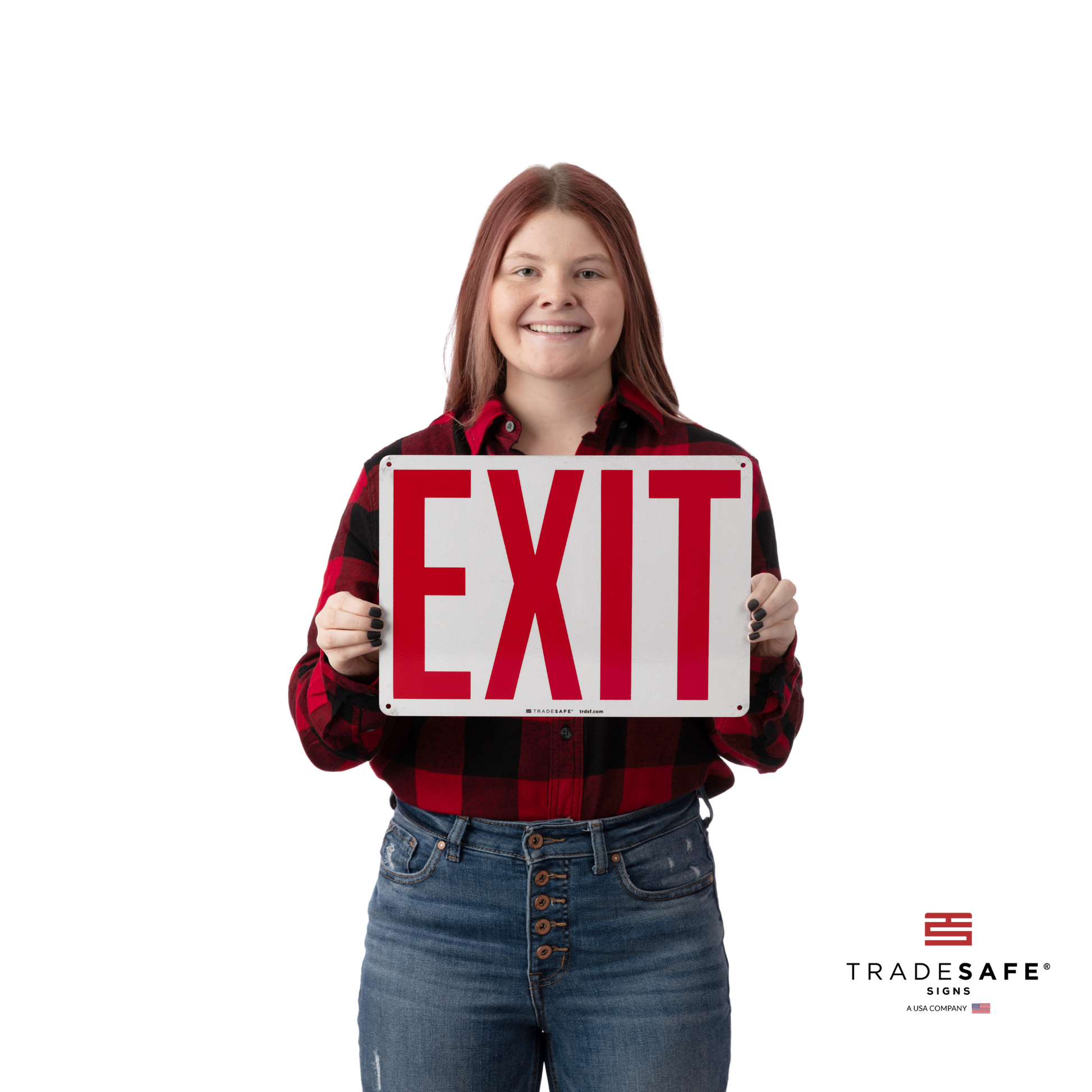 a person holding the exit sign