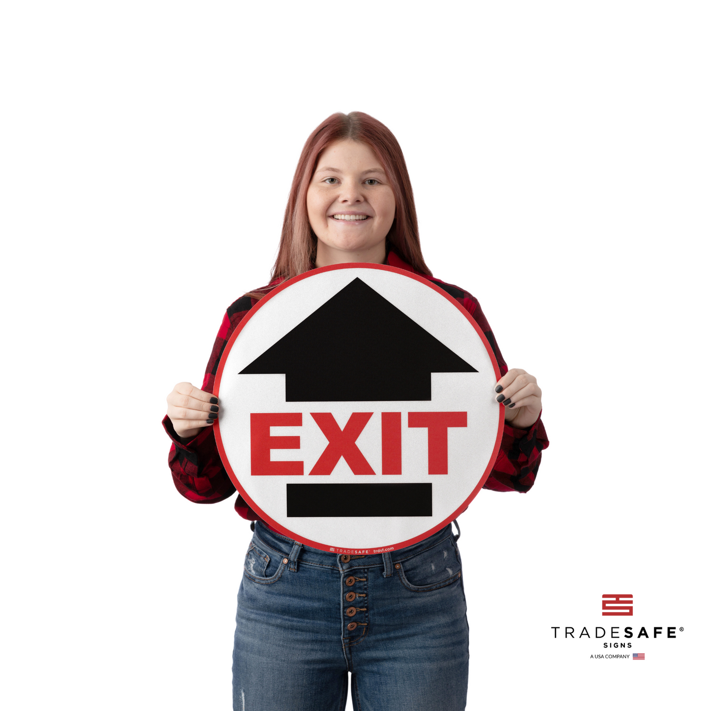 a person holding the exit sign