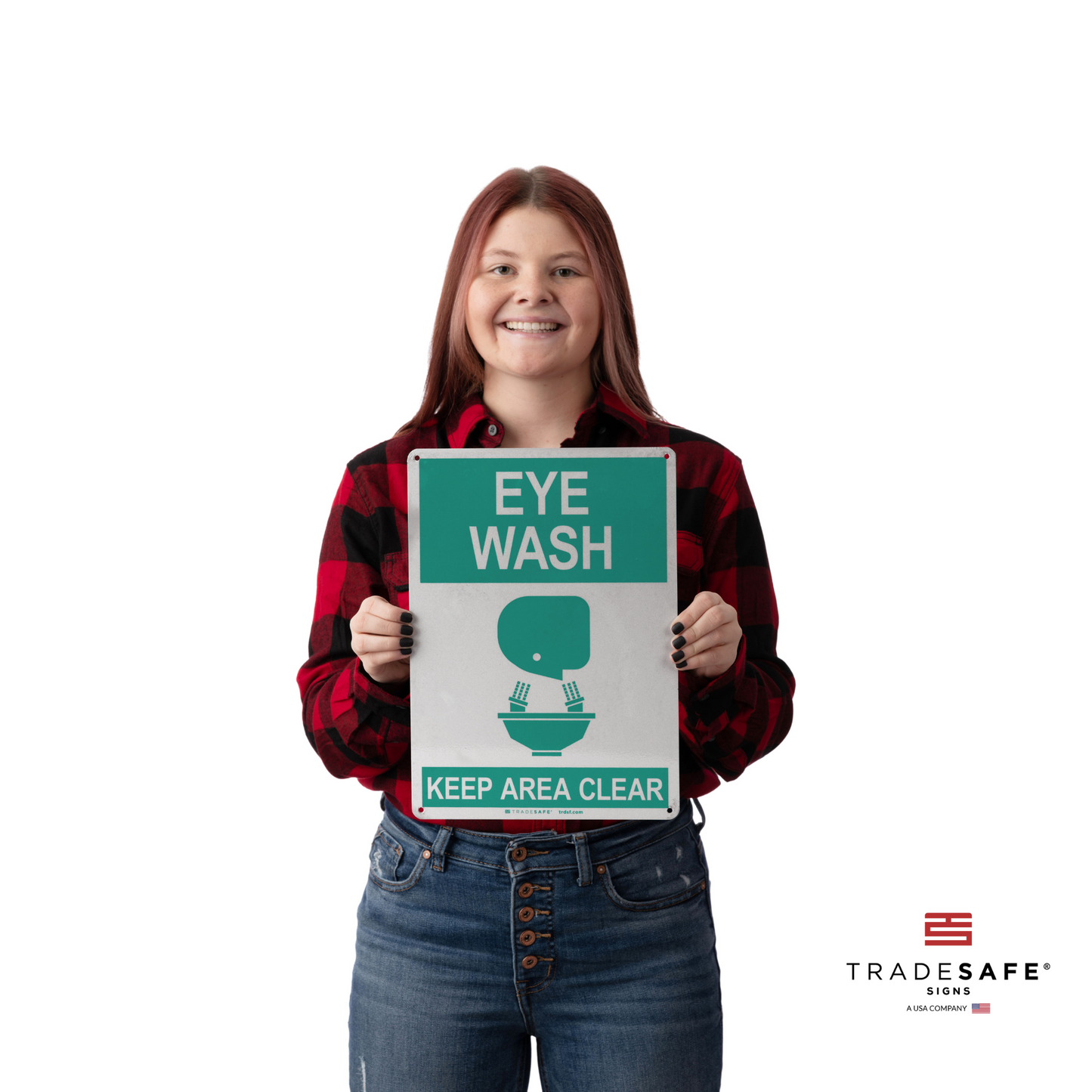 a person holding the eye wash sign