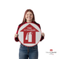 a person holding the fire extinguisher sign