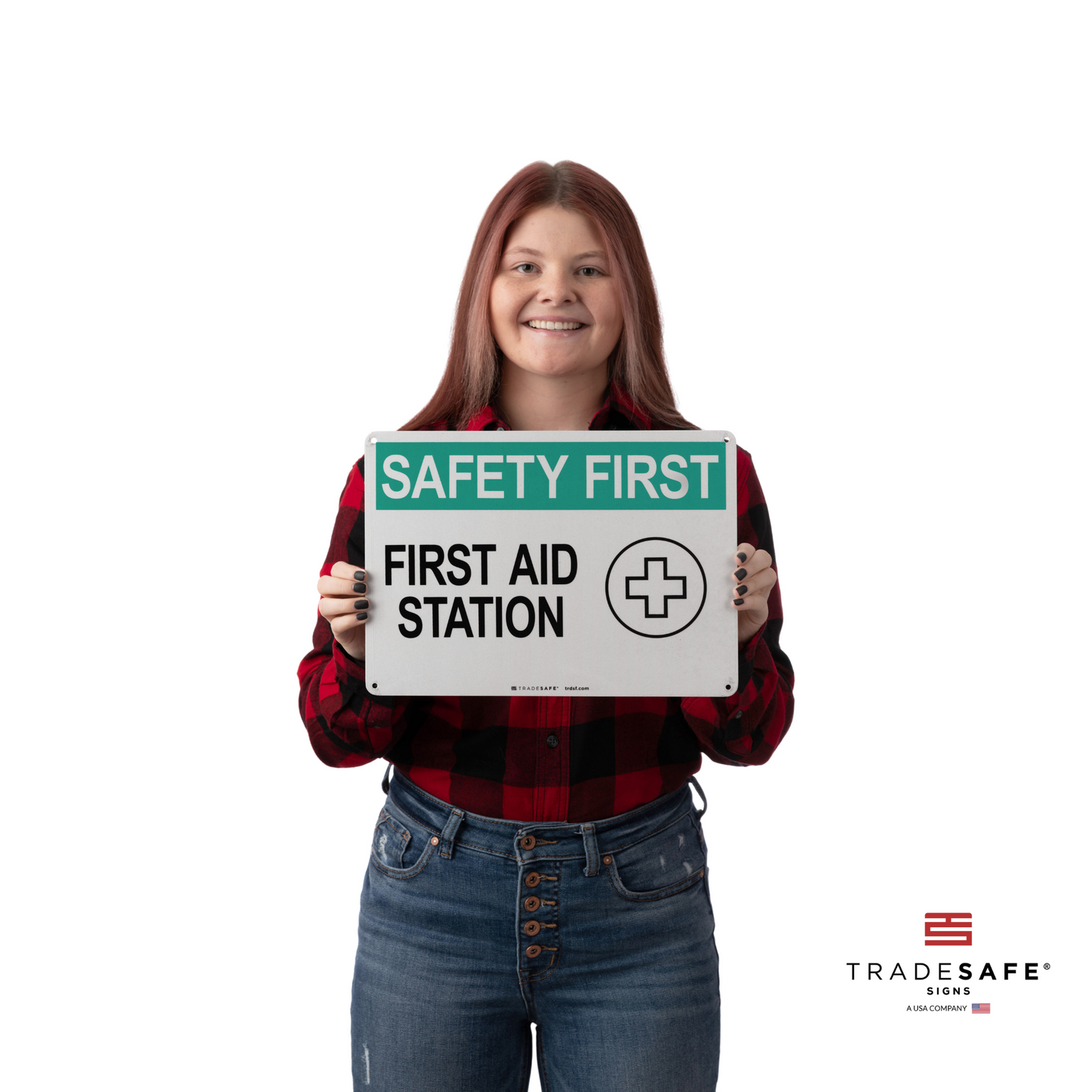 a person holding the safety first sign