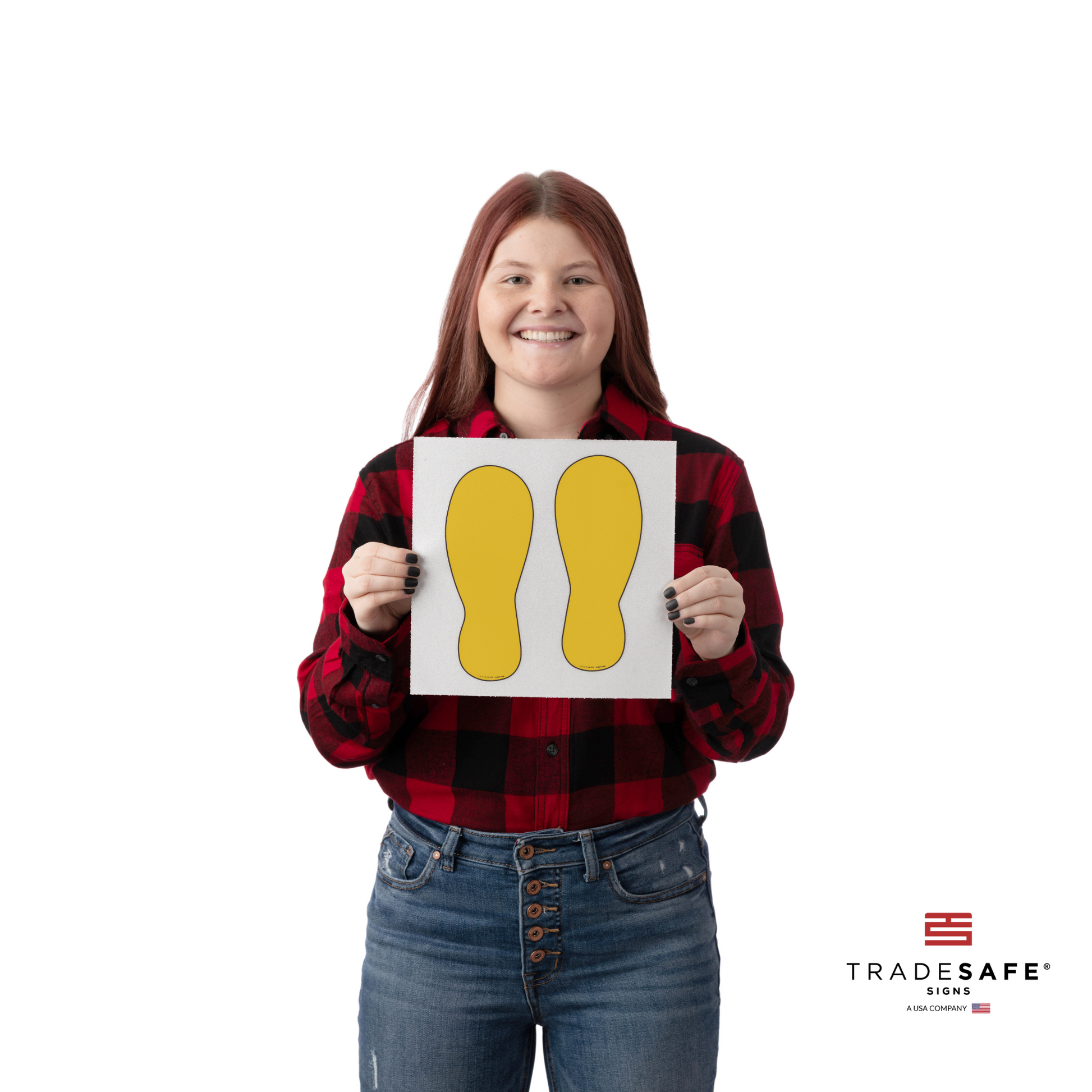 a person holding the footprint adhesive vinyl sticker