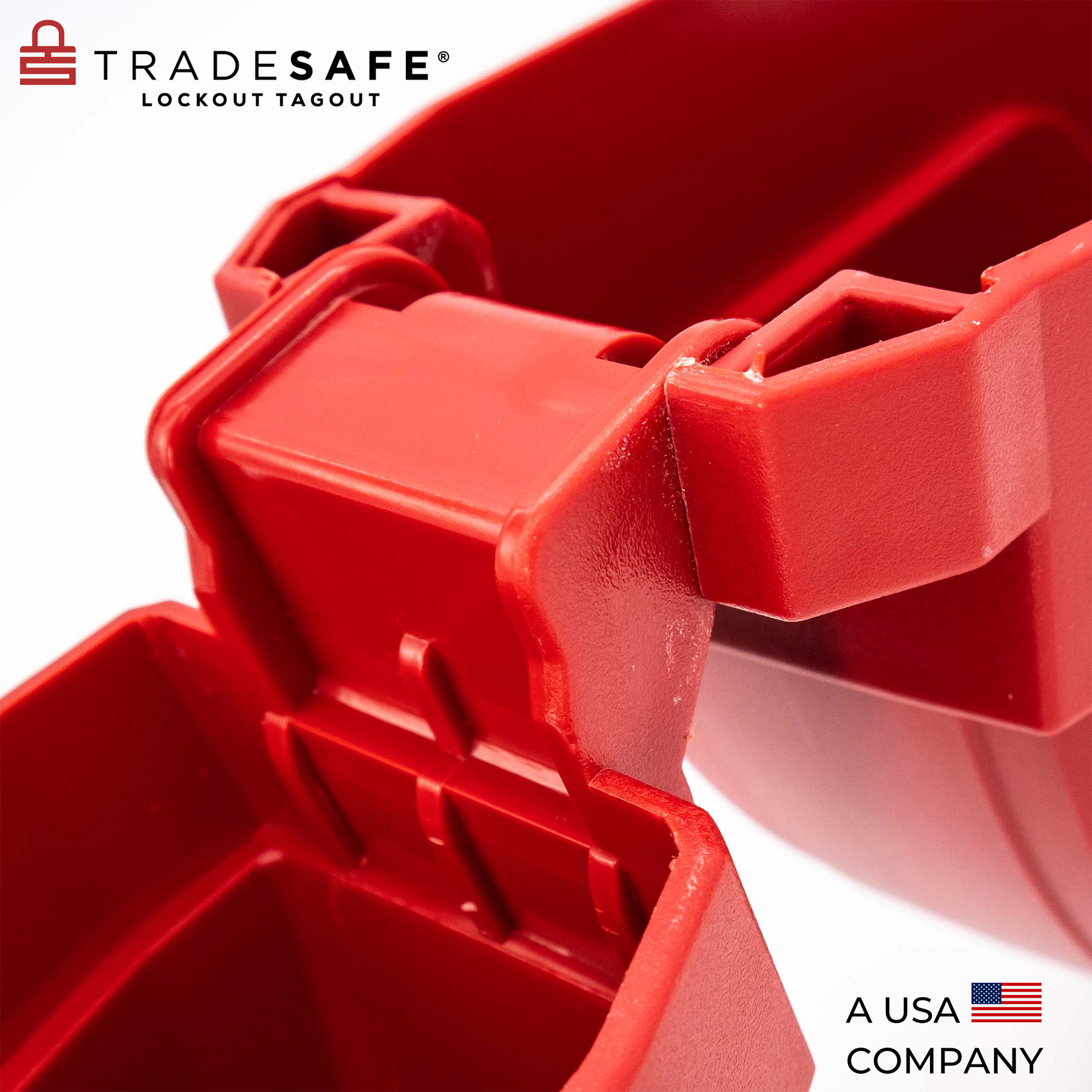 close up view of the hinge part of a fully opened red gate valve lockout device
