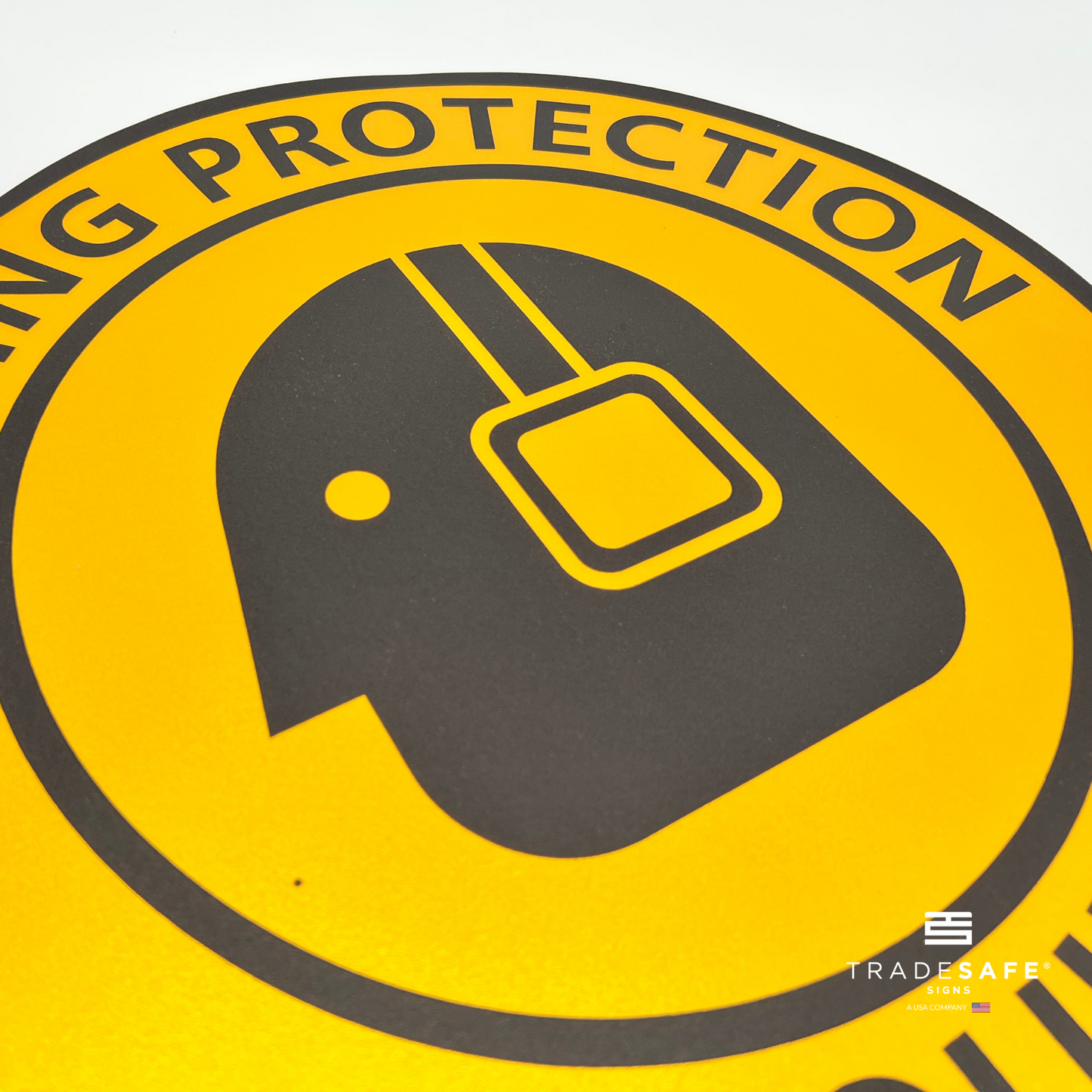 close-up of "hearing protection required" sign