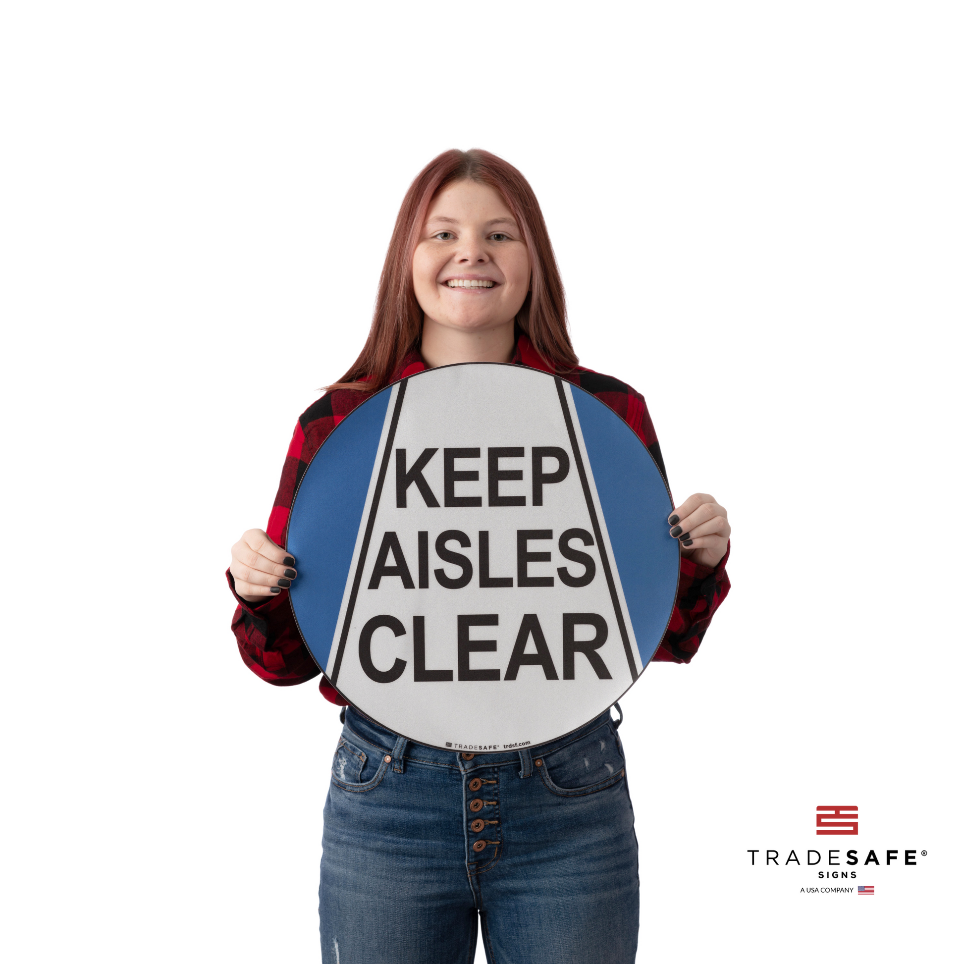 a person holding an aisle sign with the text "keep aisles clear"