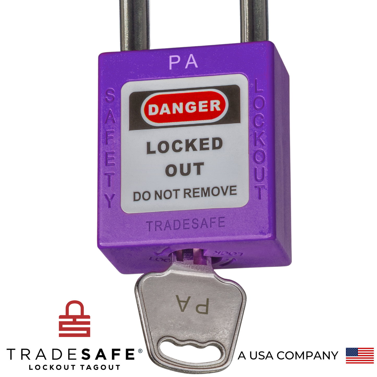 a close-up view of a purple loto padlock's body with a key inserted