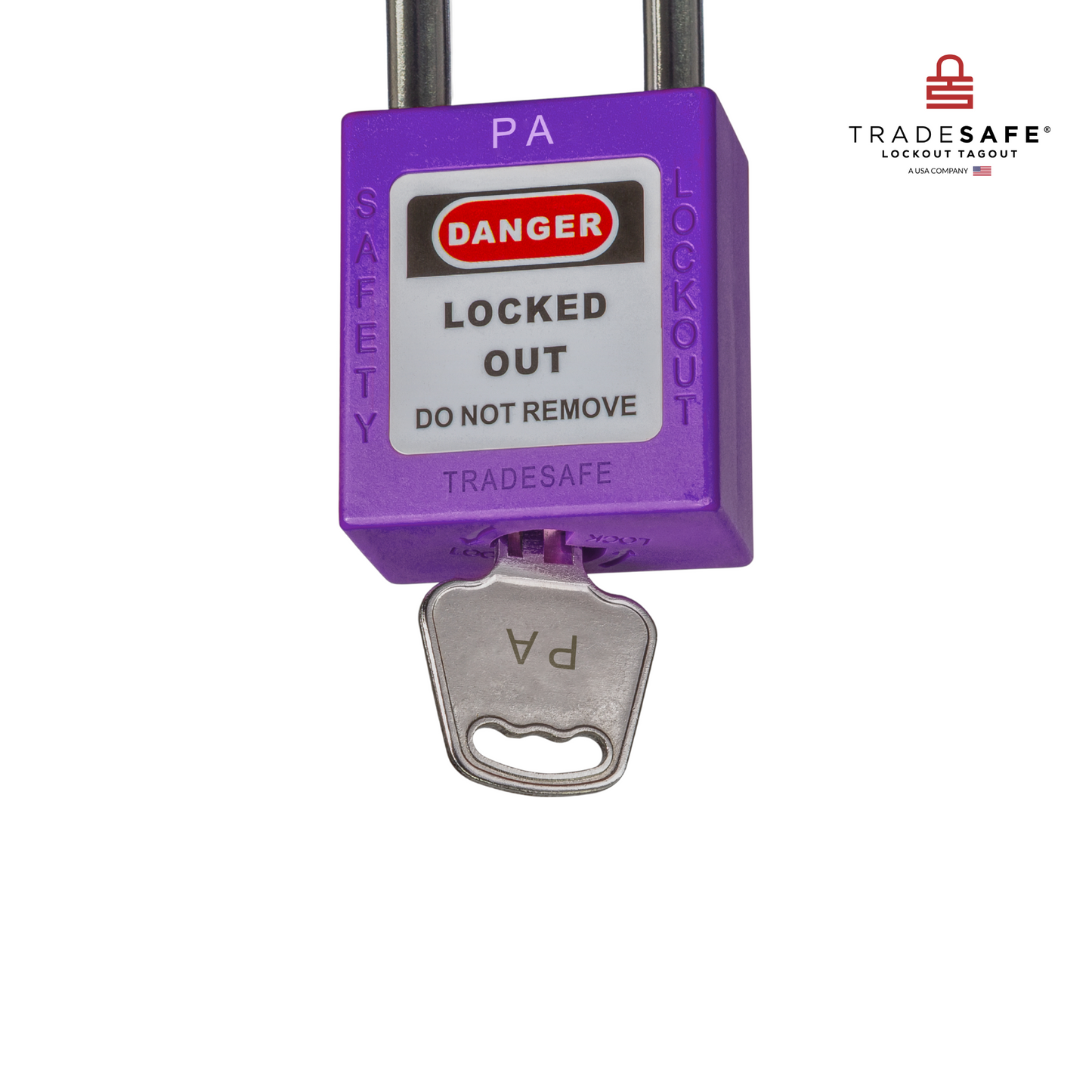 a close-up view of a purple loto padlock's body with a key inserted 
