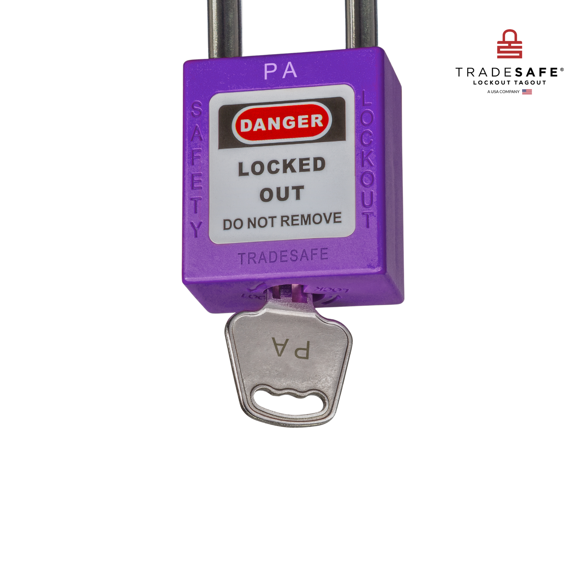 a close-up view of a purple loto padlock's body with a key inserted 