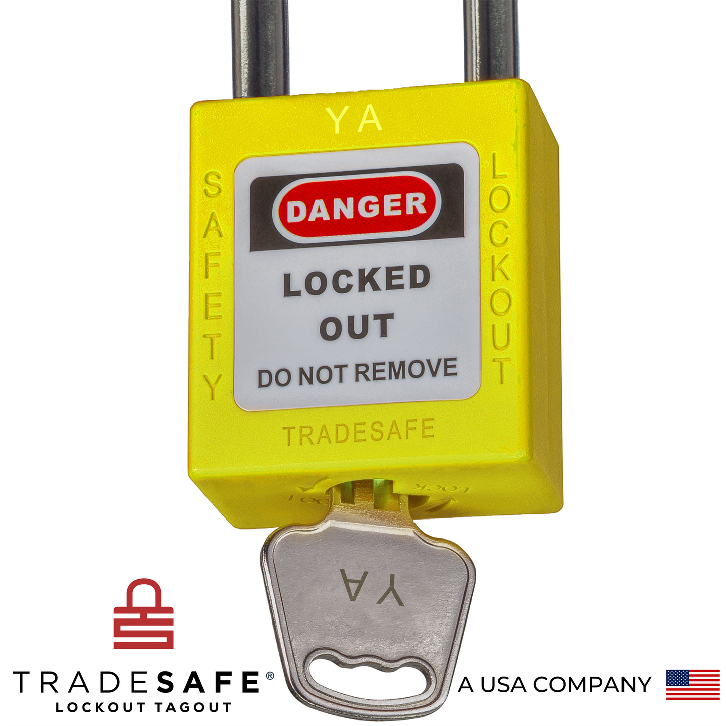 a close-up view of a yellow loto padlock's body with a key inserted