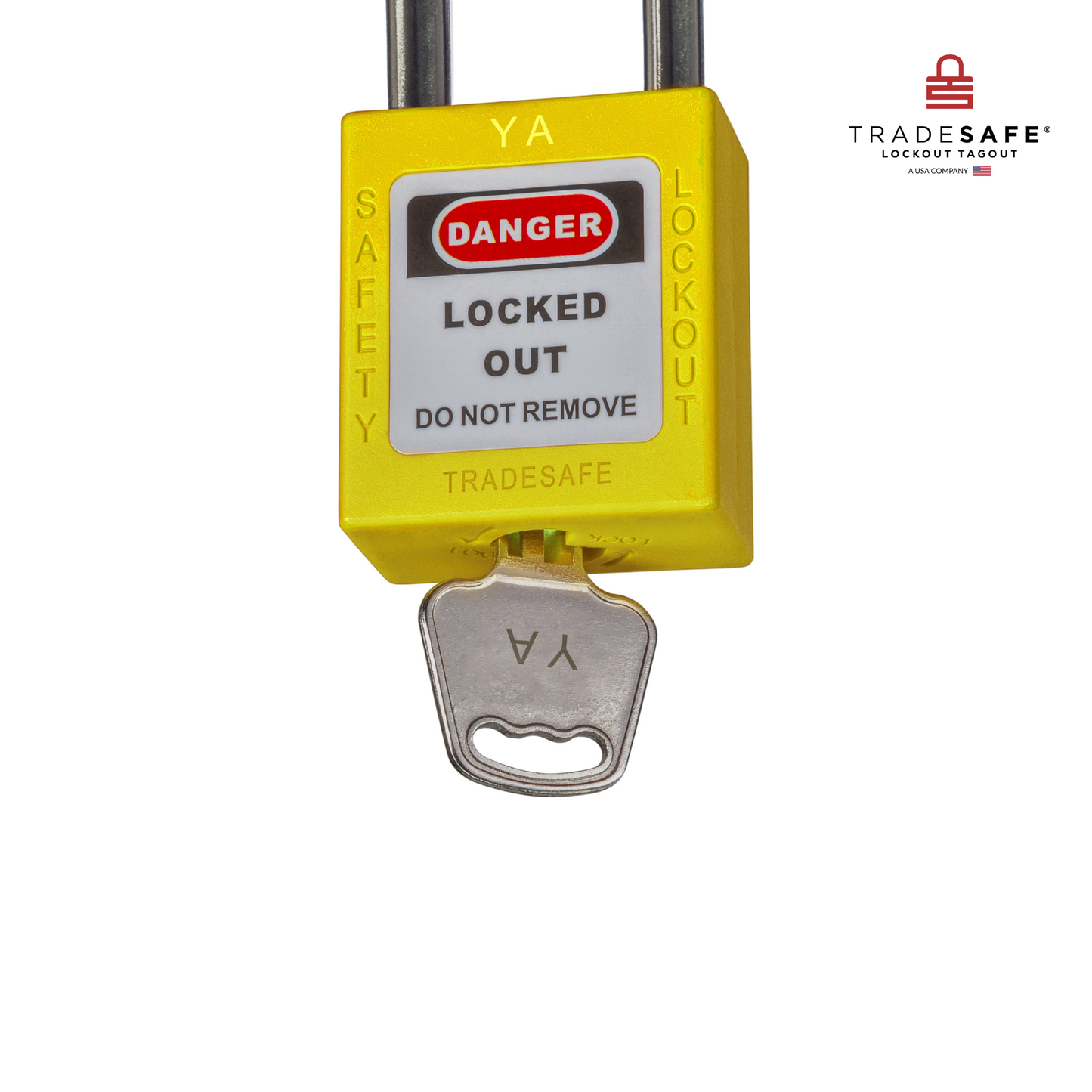 a close-up view of a yellow loto padlock's body with a key inserted 