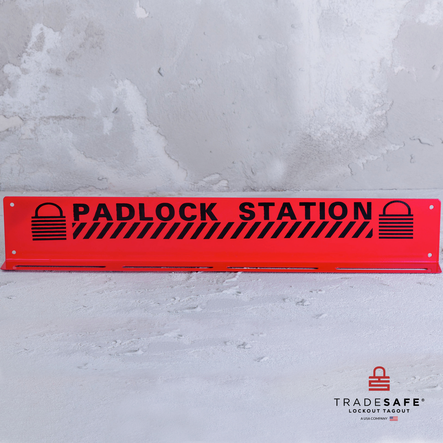 front view of a red safety padlock lockout station in an industrial setting