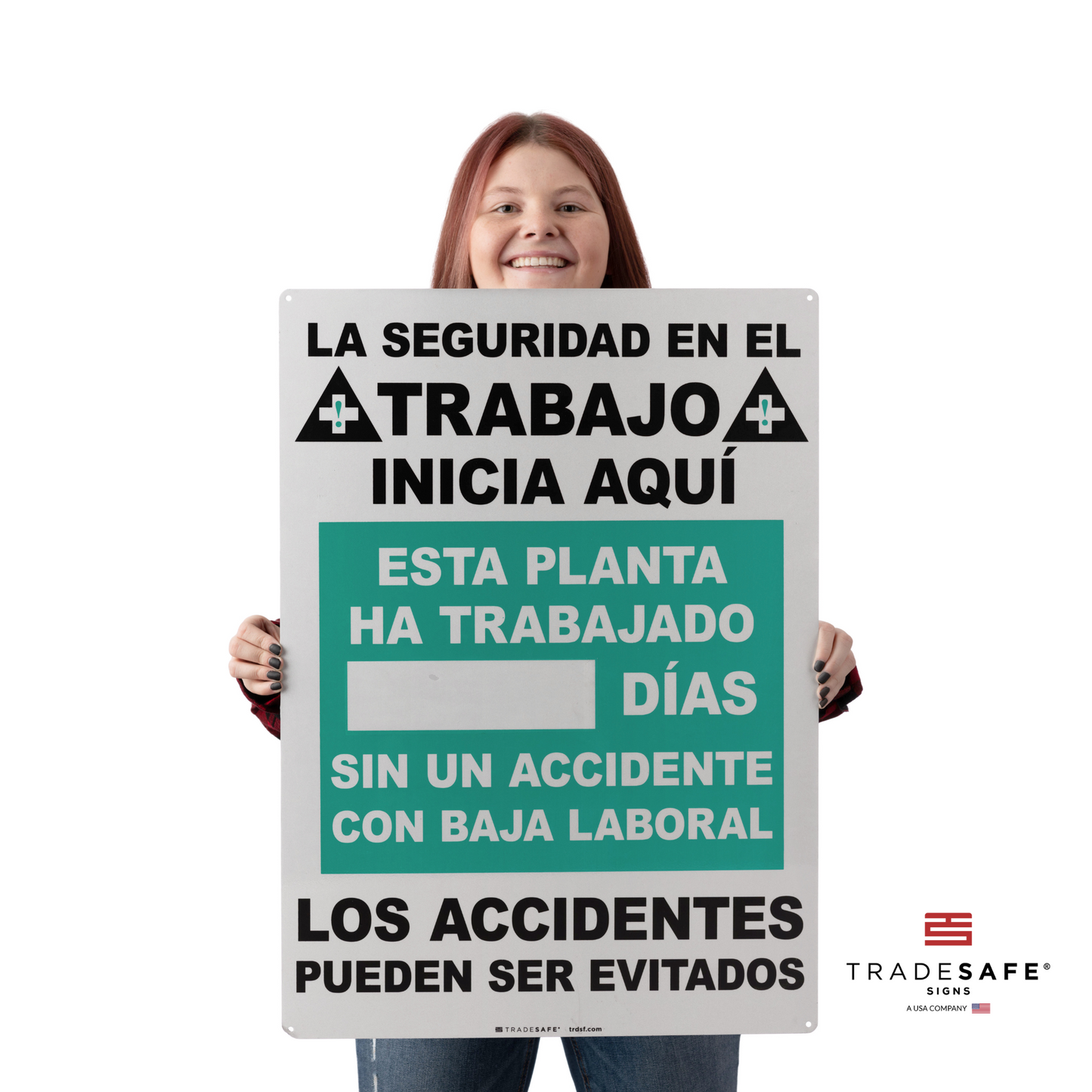 a person holding the lost time accident sign in spanish