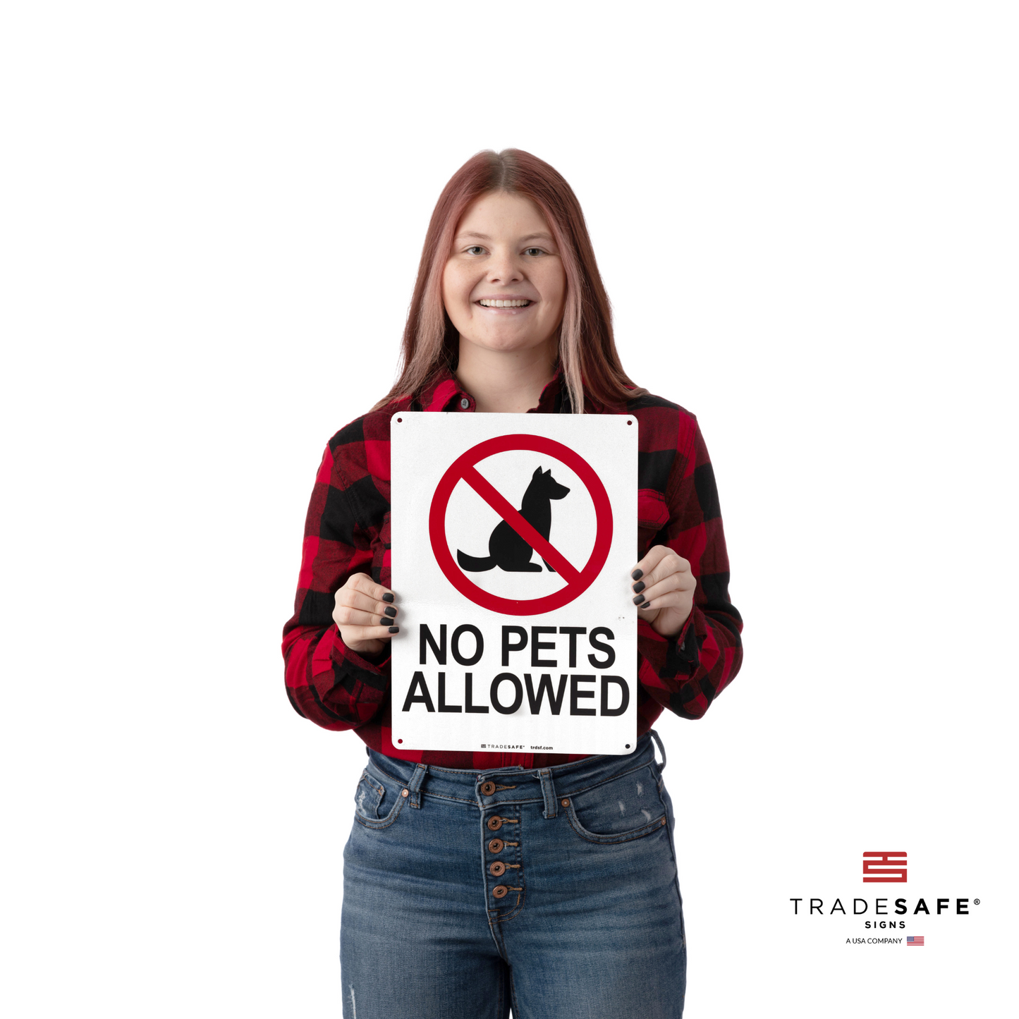 a person holding no pets allowed sign